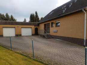 Отель Ferienwohnung Hilker  Хессиш-Ольдендорф